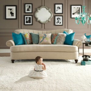 Cute baby sitting on carpet floor | CarpetsPlus COLORTILE of Hutchinson